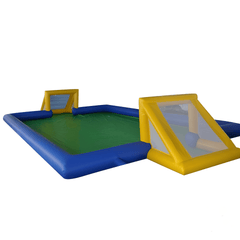 Soft Summits inflatable soccer field with vibrant green artificial grass and sturdy inflatable sides for outdoor football games.