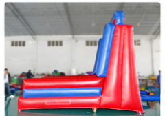 A side view of the Easy Set Up Climbing Wall from Soft Summits, highlighting its sturdy structure and compact setup for quick assembly at any event.