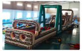 Front view of Soft Summits' commercial-size inflatable obstacle course in camouflage design, perfect for adventurous and action-packed events.
