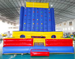 Front view of Soft Summits' inflatable climbing wall and outdoor playground, featuring vibrant colours and multiple climbing routes for endless fun.