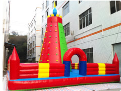 Angled view of Soft Summits' inflatable rock wall, showcasing its impressive height and dynamic climbing paths.