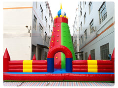 Front view of Soft Summits' large inflatable climbing mountain, featuring vibrant colors and challenging routes for adventurous fun.