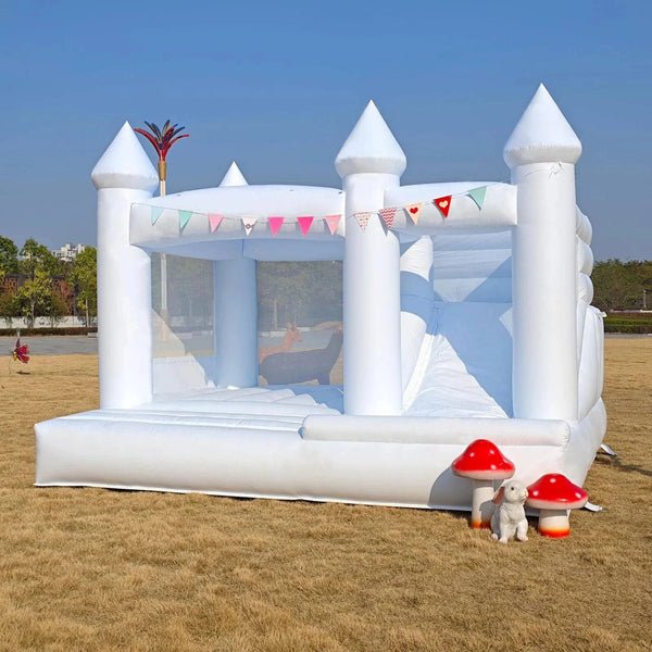 White inflatable bounce house with large slide by Soft Summits, featuring vibrant colors and spacious jumping area for kids.