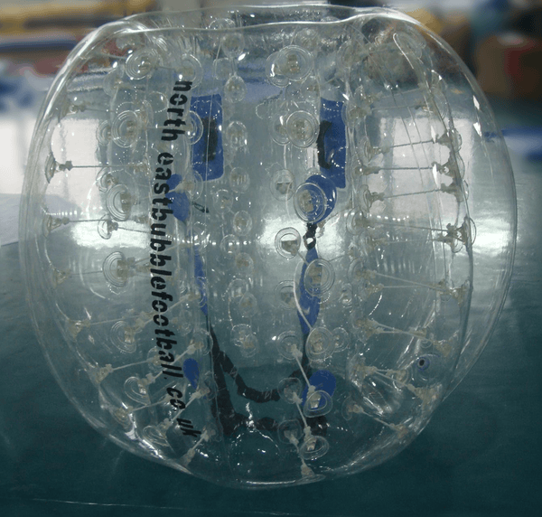 Close-up of a Soft Summits inflatable bumper ball resembling a basketball, showing the detailed surface texture.