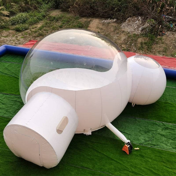 Soft Summits inflatable igloo top view showing the white, dome-shaped structure with a smooth surface and rounded entrance opening.