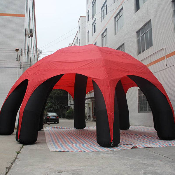 Inflatable spider-shaped dome tent by Soft Summits, portable event shelter with a unique spider design for outdoor events.